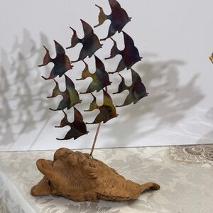 vintage mid-century modern handcrafted school of fish attached to Driftwood